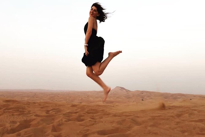 Dubai Evening Desert Safari with BBQ & Live Entertainment - Falcon photos, henna, and the camp setting