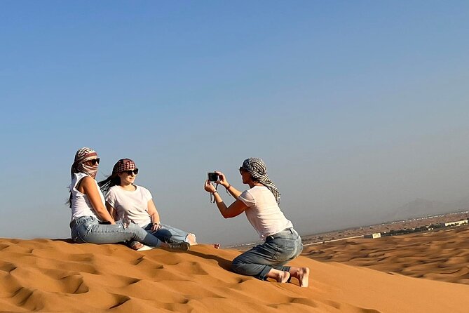 Dubai Evening Desert Safari with Quad bike, Dinner and Show - A short camel ride before dinner