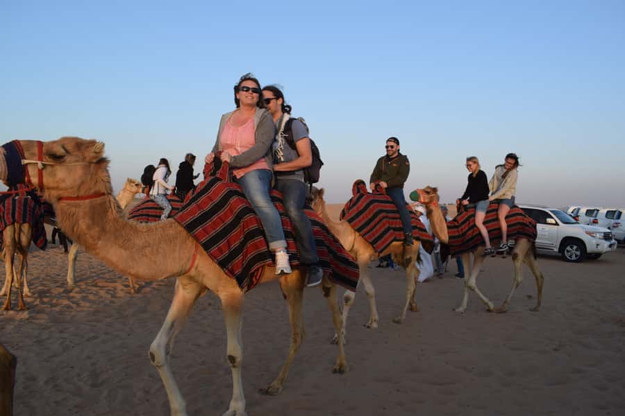Dubai: Evening Tour with Quad Biking, Camel Ride, and BBQ - Dune bashing across the Red Desert