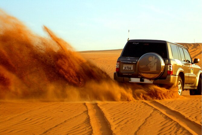 Dubai Evening4x4Desert Safari BBQ Dinner,4 Live Shows,Camel Ride - From Dubai streets to open red dunes