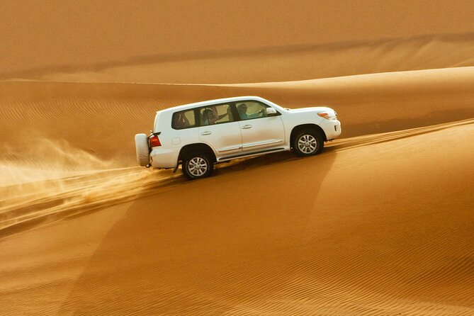 Dubai Evening4x4Desert Safari BBQ Dinner,4 Live Shows,Camel Ride - Sunset photos on the dunes