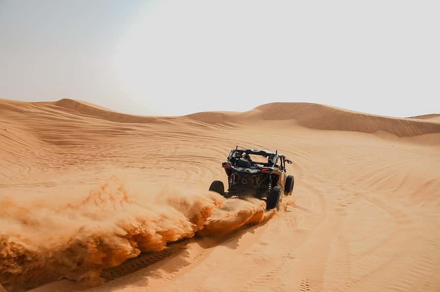 Dubai: Extreme Can-Am Buggy Desert Safari Adventure - Sandboarding adds a short, playful stop
