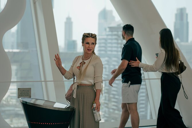 Dubai: Frame Tickets, Creek, Souks & Blue Mosque Guided Tour - Crossing Dubai Creek by abra