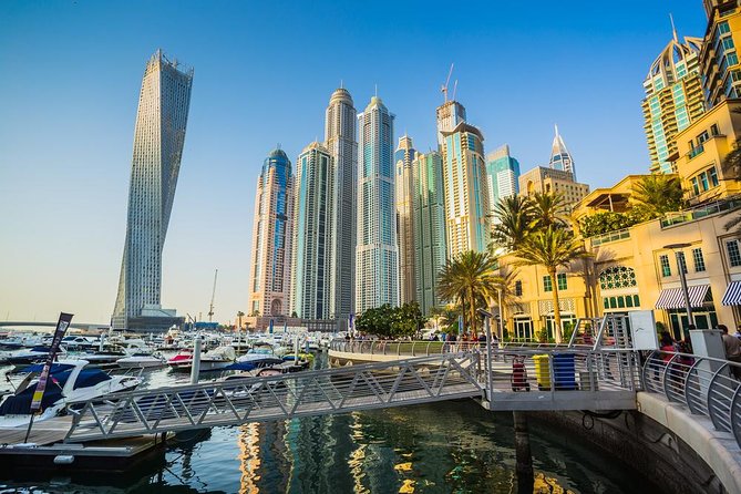 Dubai Full-Day Spanish Language Tour - City of Contrasts - Textile Souk and Dubai’s cloth trade