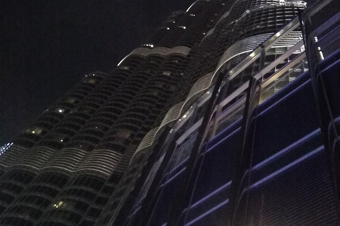 Dubai Full-Day Tour with Dinner and Burj Khalifa Entry Ticket - Burj Khalifa at night, the tour’s main payoff