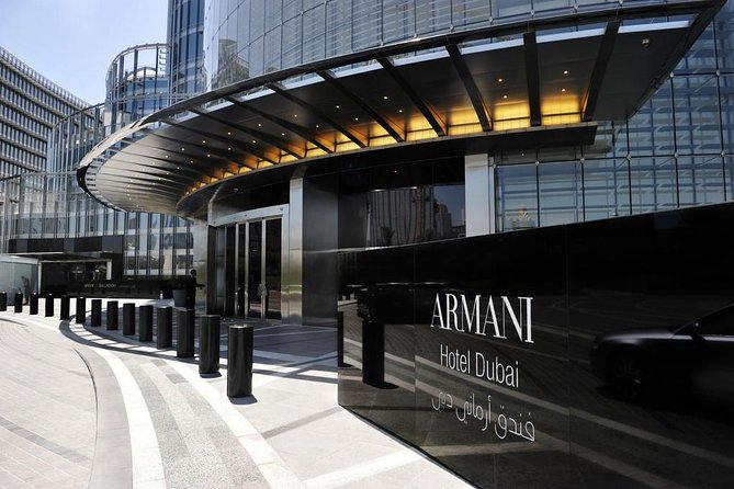 Dubai Full-Day Tour with Dinner and Burj Khalifa Entry Ticket - Dubai Marina by boat, with towers all around you