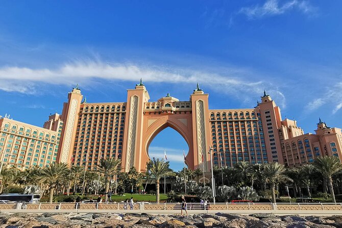 Dubai Half Day City Tour With Burj Khalifa Ticket - Crossing Dubai Creek by traditional abra
