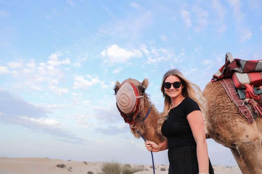 Dubai: Half-Day Desert Safari, Camel Ride, ATV & Dune Buggy - Sandboarding on soft red slopes
