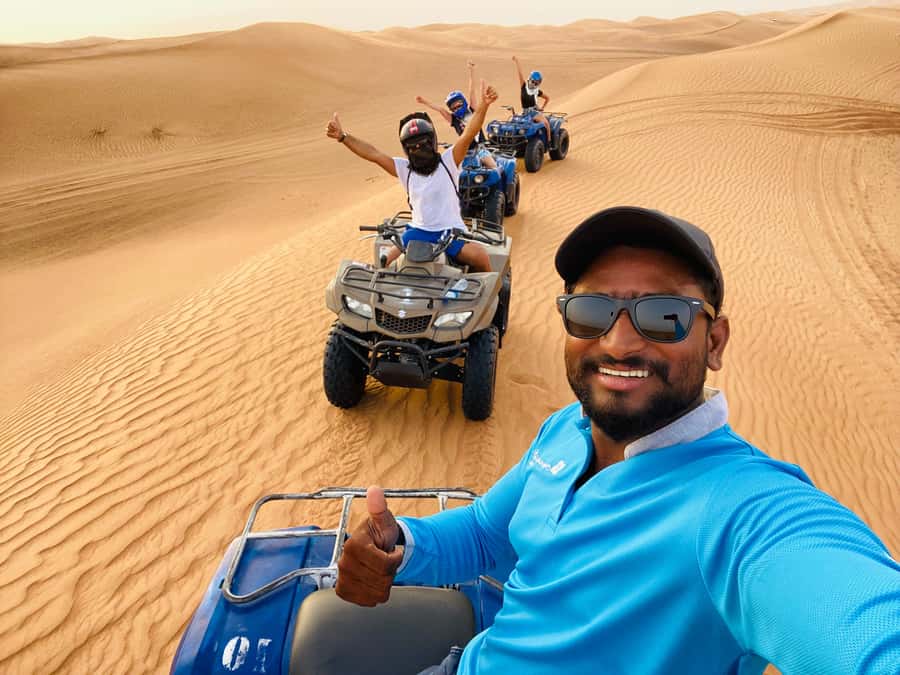 Dubai: Half-Day Desert Safari, Camel Ride, ATV & Dune Buggy - A short camel ride and falcon photos