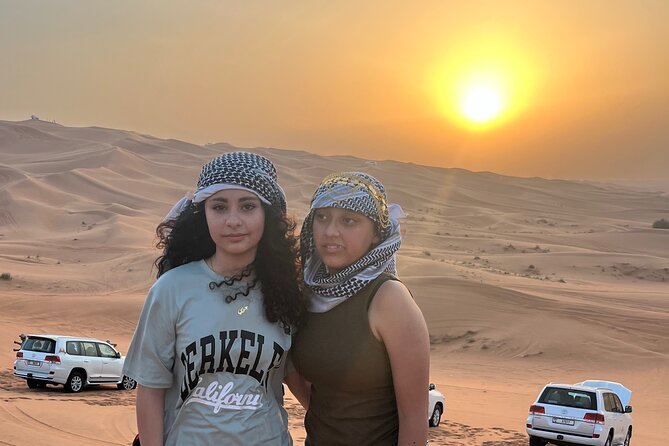 Dubai: Half-Day Desert Safari ,Camels & Sunset - Sandboarding adds a simple active challenge