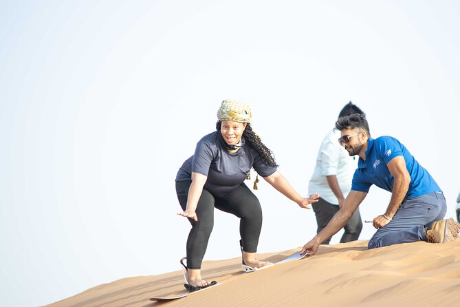 Dubai Half-day Red Dunes bashing with Sandboarding, Camel &Falcon - Falcons, Arabic dress, and henna photos