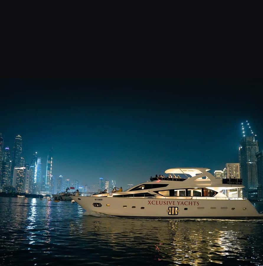 Dubai Harbor: Luxury Yacht Tour with BBQ Options - Dubai Marina, where the towers close in