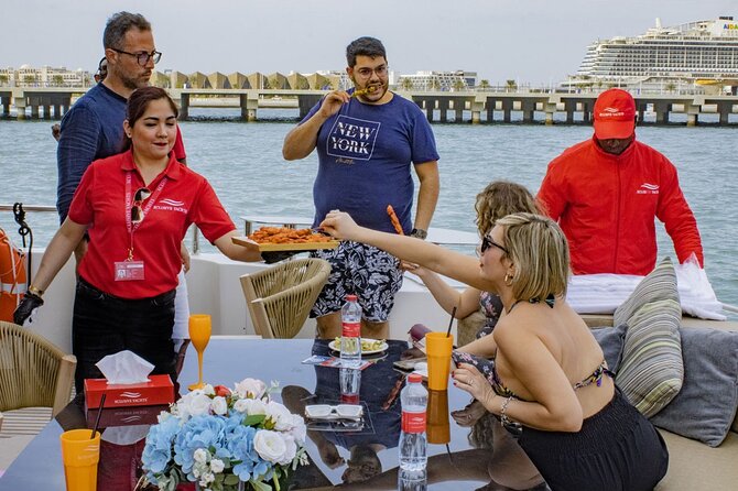 Dubai Harbour Super Yacht Experience with gourmet & Drinks - The DJ, swimming stop, and onboard mood