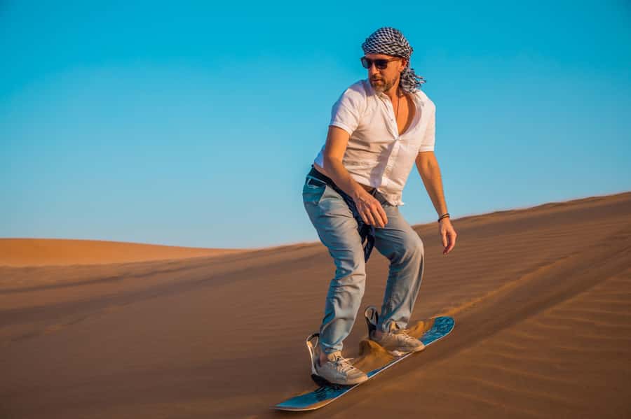 Dubai: Helicopter Ride, Desert Safari, Camels & Refreshments - Dune bashing, with real motion and real limits