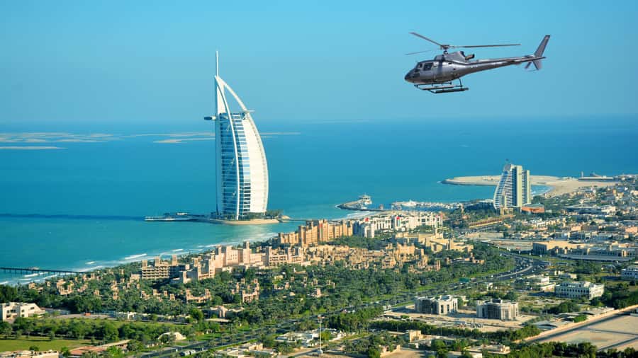 Dubai: Helicopter Ride, Desert Safari, Camels & Refreshments - Camel riding and the quieter side of the desert
