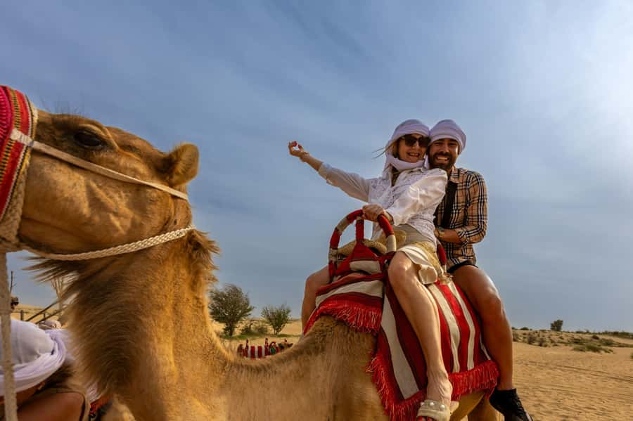Dubai: Helicopter Ride, Desert Safari, Camels & Refreshments - Quad biking on the red dunes