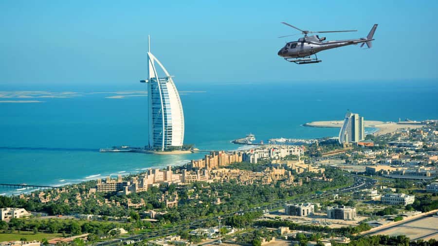 Dubai: Helicopter Ride, Old Town Walking Tour, Abra & Snacks - Key points to know before booking
