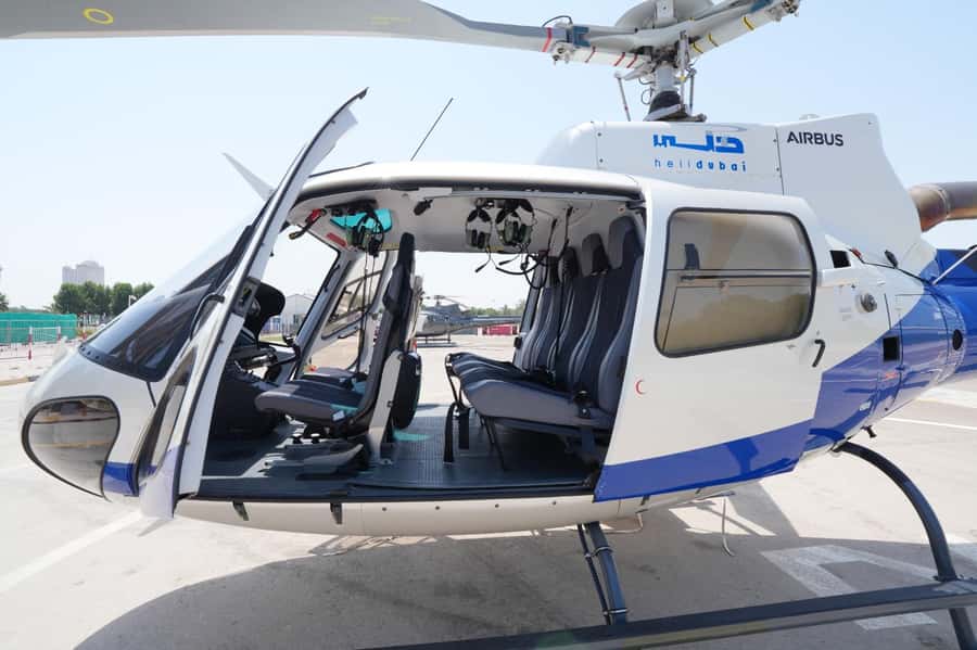 Dubai: Helicopter Ride, Old Town Walking Tour, Abra & Snacks - The guide can make a tight schedule work