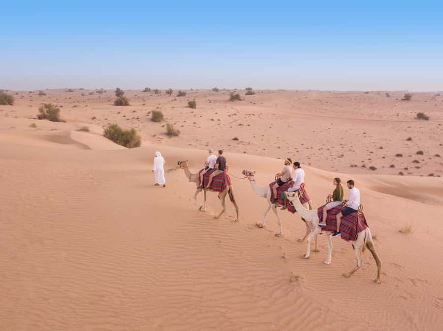 Dubai: Heritage Camel Desert Safari with Traditional Dinner - Entering the Bedouin-style camp