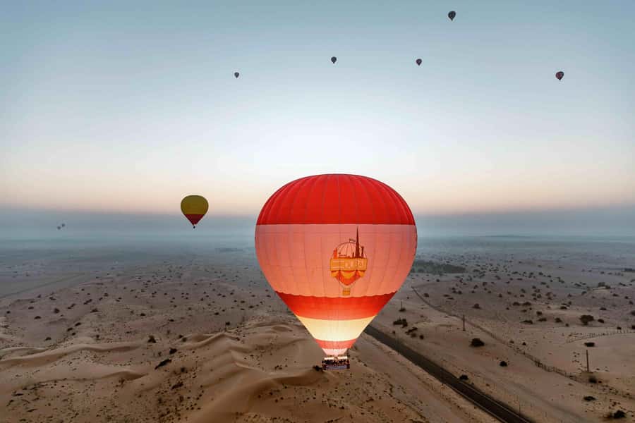 Dubai: Hot Air Balloon, Desert Safari, and Quad Biking Tour - Why the sunrise balloon flight is the main event