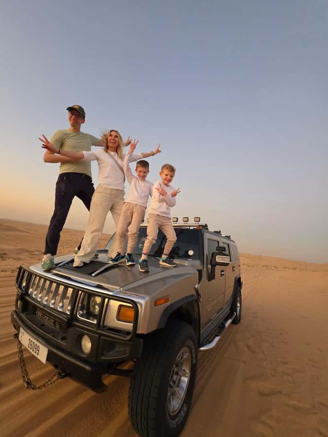 Dubai Hummer Safari Adventure & Traditional Dress Photoshoot - Photo stops, sunset views, and the traditional dress question