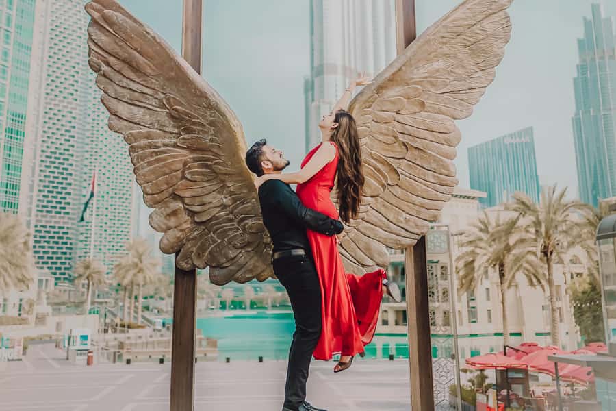 Dubai: Iconic Burj Khalifa Pre-Wedding Photoshoot - Dubai Mall Park Bridge frames the couple with clean lines