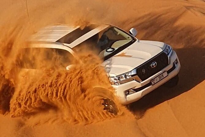 Dubai: Jeep Desert Safari, Camel Ride, and Quad Bike Tour - Guides, photos, and the level of service