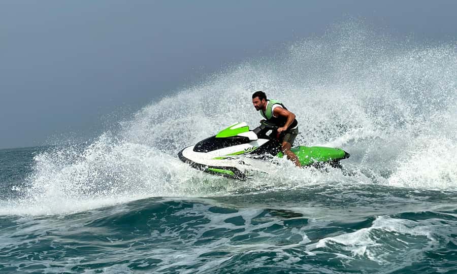 Dubai: Jetski Tour to Dubai Eye, JBR, Palm & Burj Al Arab - From marina speed limits to open water