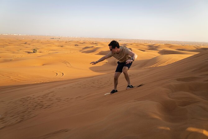 Dubai Long Self-Drive Quadbike with Camel and Falcon - Sandboarding between two ATV rides