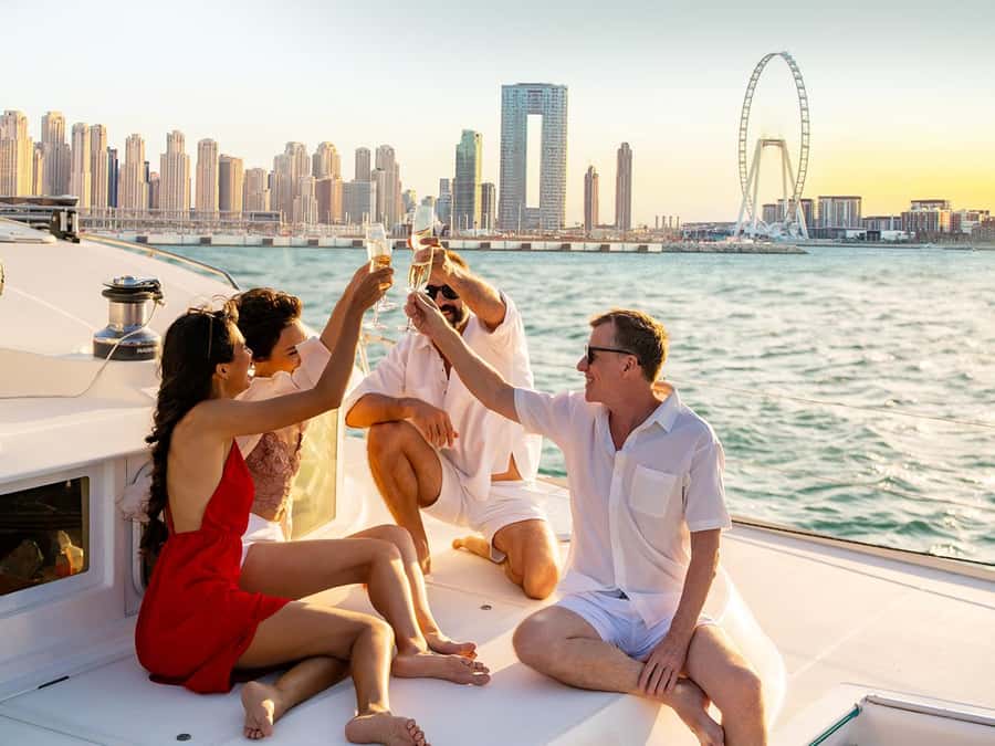 Dubai: Luxury Sunset Yacht Tour with Snacks and Drinks - The boat, seating, and onboard mood