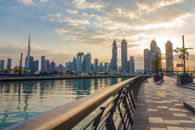 Dubai Magical Day & Night Tour In A Private Vehicle - Dubai Water Canal on the way across town