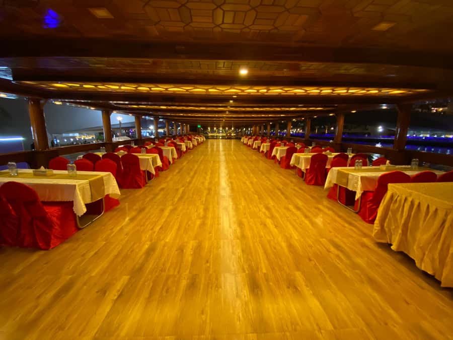 Dubai Marina: Dinner Cruise in a Traditional Boat - Boarding the Ocean Empress behind Silverene Tower
