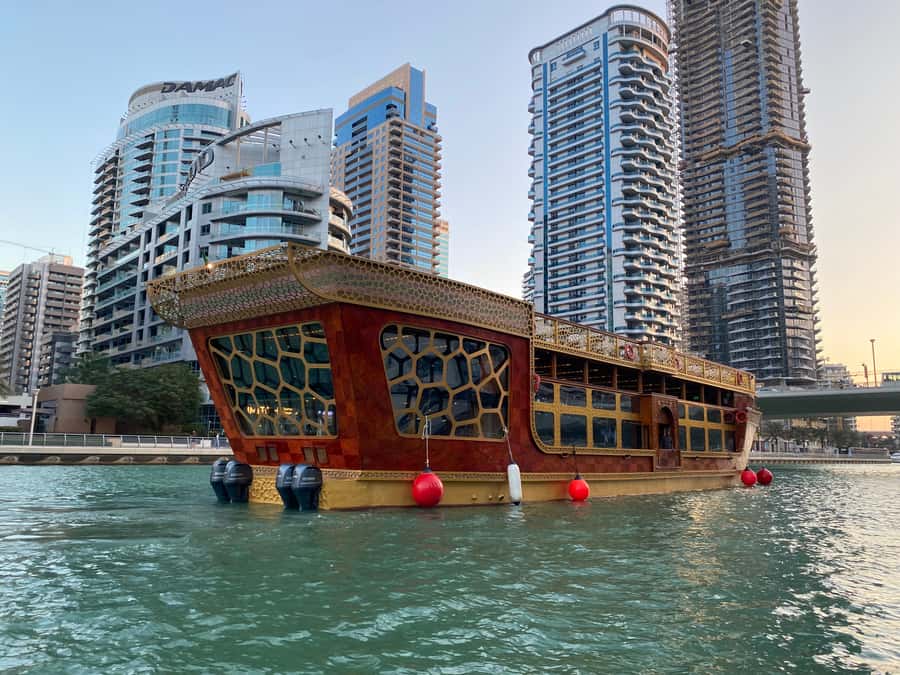 Dubai Marina: Dinner Cruise in a Traditional Boat - Watching Dubai Marina light up