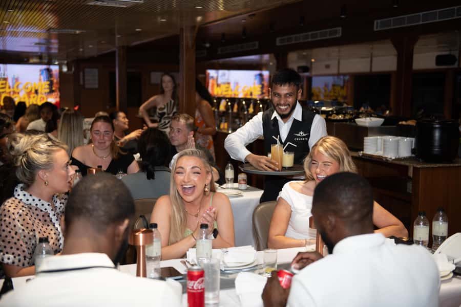 Dubai Marina: Luxury Dinner Cruise, Live Show, Open Bar & DJ - Boarding a modern catamaran