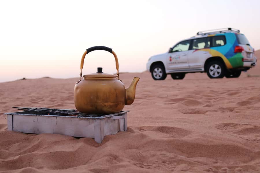 Dubai: Morning Desert Safari with Camel Ride & Sandboarding - Sandboarding on the rolling dunes
