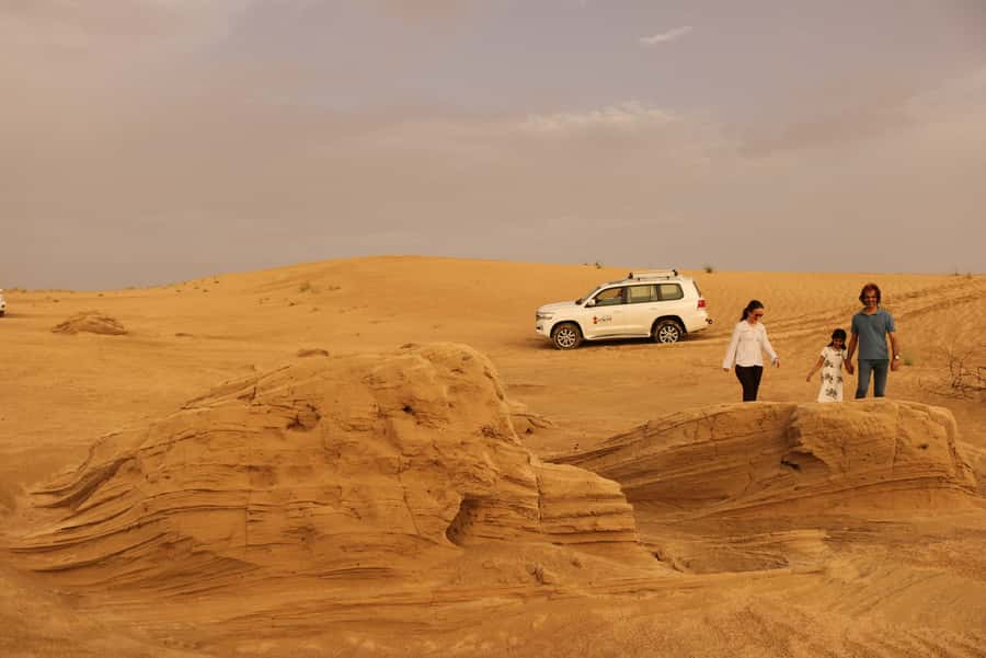 Dubai: Morning Desert Safari with Camel Ride & Sandboarding - A five-minute camel ride and desert camp