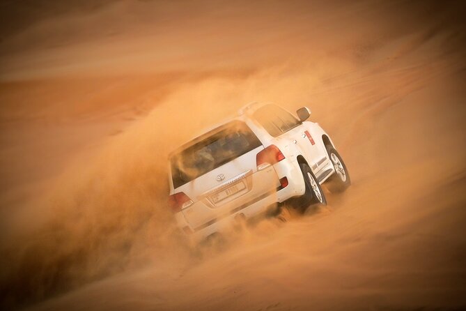 Dubai Morning Desert Safari with Quad Biking & More Activities - Sandboarding and the short camel ride