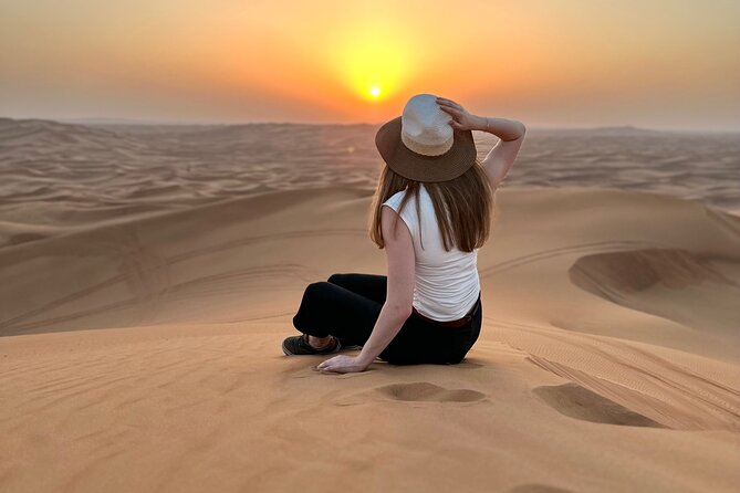Dubai Morning Evening Desert Safari,Sand boarding and Camel ride - Optional quad biking in a fenced area