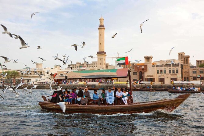 Dubai Old Town, Culture, History, Street food and Souks Tour - Crossing the creek by traditional abra