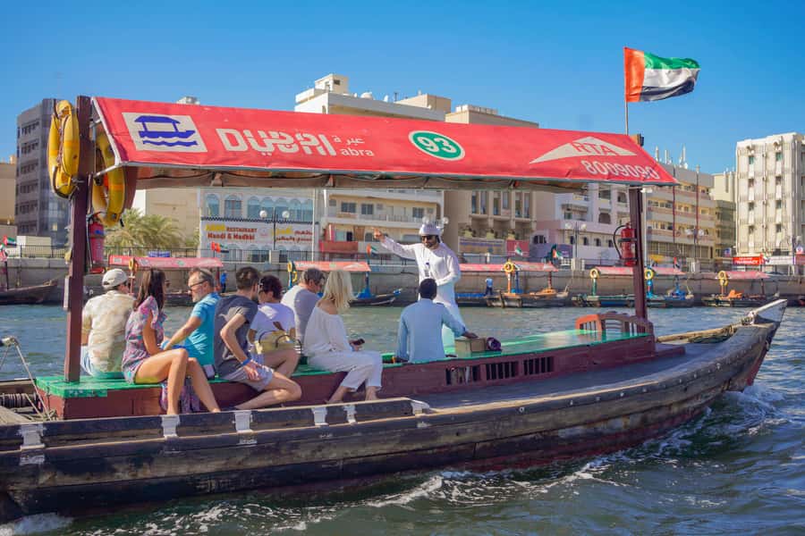 Dubai: Old Town, Street Food, Creek, Souks, & Emirati House - Crossing Dubai Creek by abra