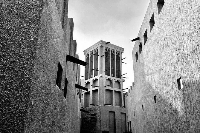 Dubai Old Town Walking Tour with Abra ride, Spice and Gold Souk - Starting among the wind towers of Al Fahidi