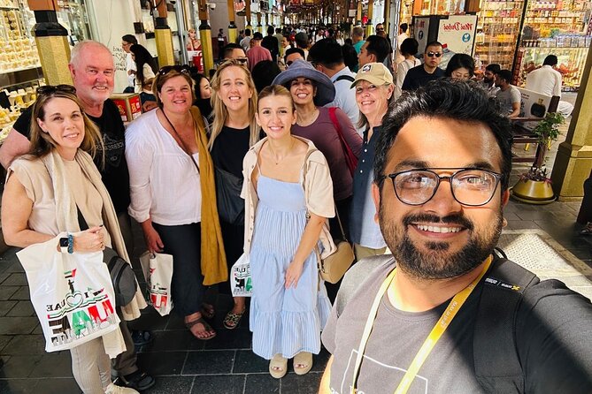 Dubai Old Town Walking Tour with Abra ride, Spice and Gold Souk - Crossing Dubai Creek by abra