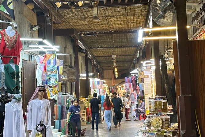 Dubai Old Town Walking Tour with Abra ride, Spice and Gold Souk - Timing, walking comfort, and guide style