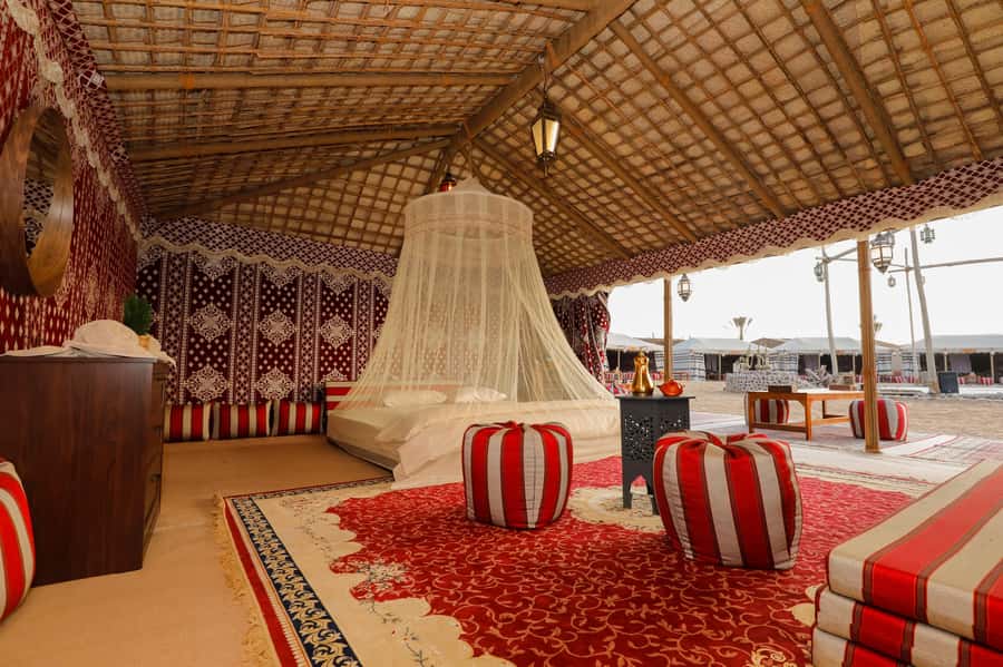 Dubai: Overnight Safari, Dinner, Stargazing & Al Khayma Camp - Al Khayma Camp: coffee, camels and a carefully staged evening