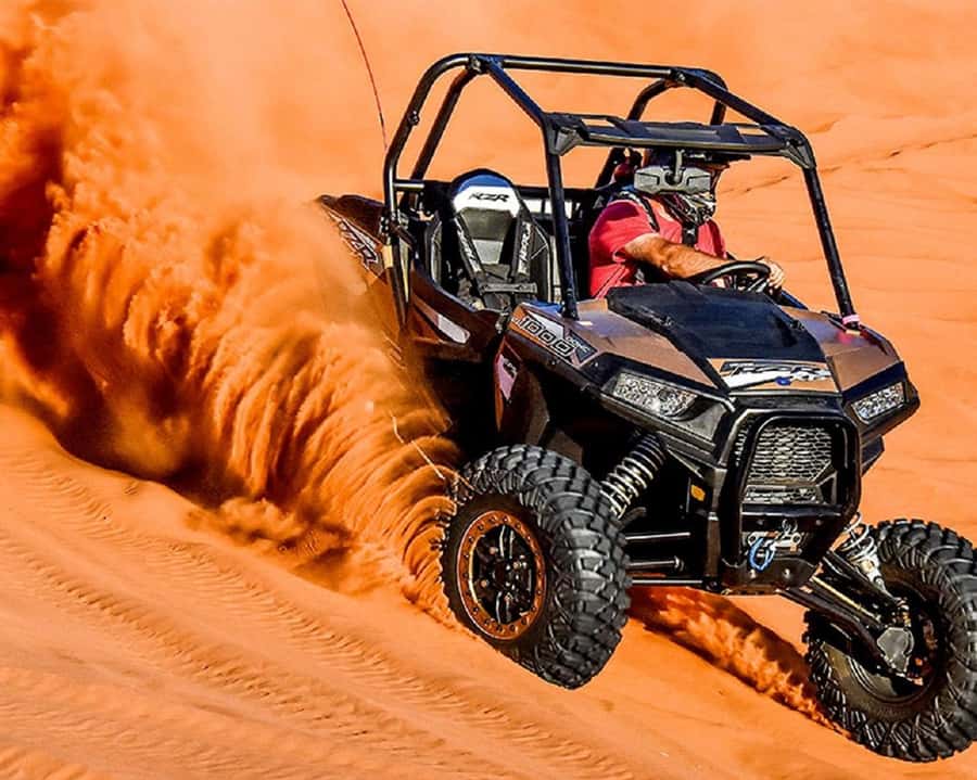 Dubai: Polaris RZR and Sandboarding Desert Adventure - Taking the wheel of the Polaris RZR