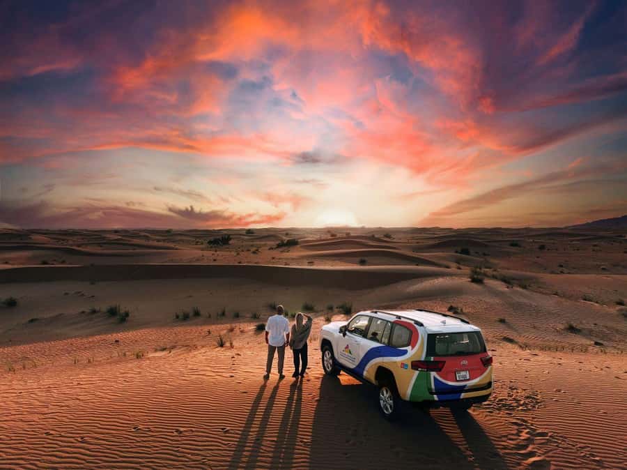 Dubai: Premium Desert Safari, Camel Ride, BBQ & Sandboarding - Dune bashing in a purpose-built 4x4
