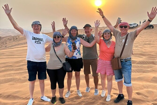 Dubai Private 4x4 Car Desert Safari with Dinner, Camel, and Show - Sandboarding and desert photographs