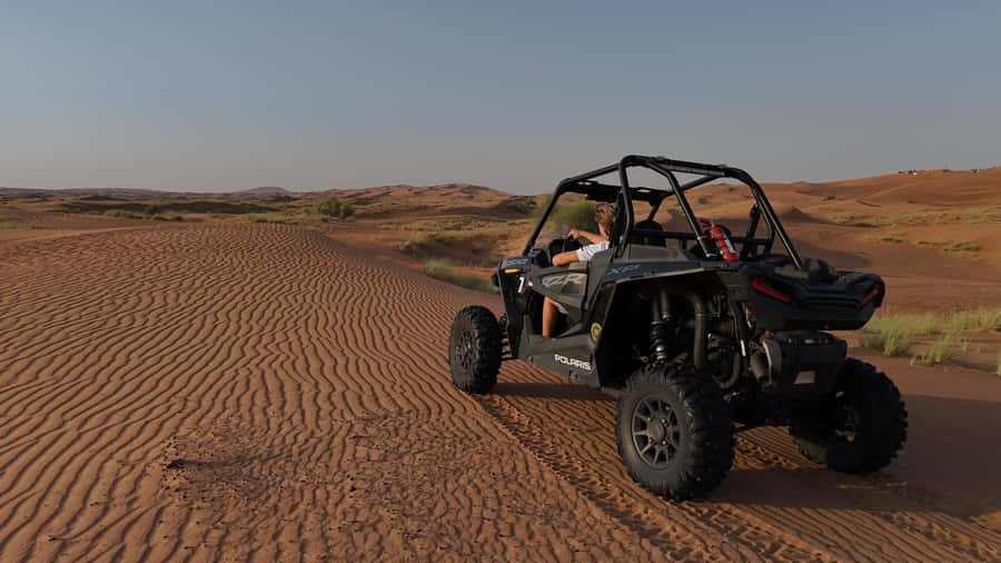 Dubai: Private Dune Buggy, Camel Ride, and Sand Boarding! - Meeting John the desert camel
