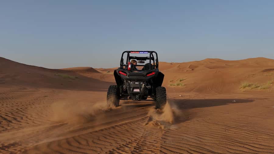 Dubai: Private Dune Buggy, Camel Ride, and Sand Boarding! - Sunset, views, and the camp atmosphere