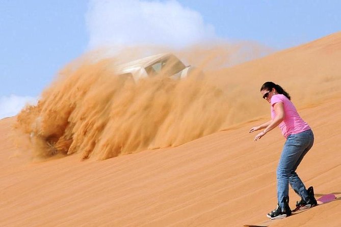 Dubai Private Morning Desert Safari: Camel Ride & Sandboarding - Sandboarding on the dune slopes